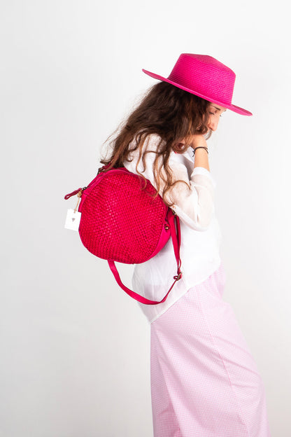 Borsa donna pelle intrecciata fucsia