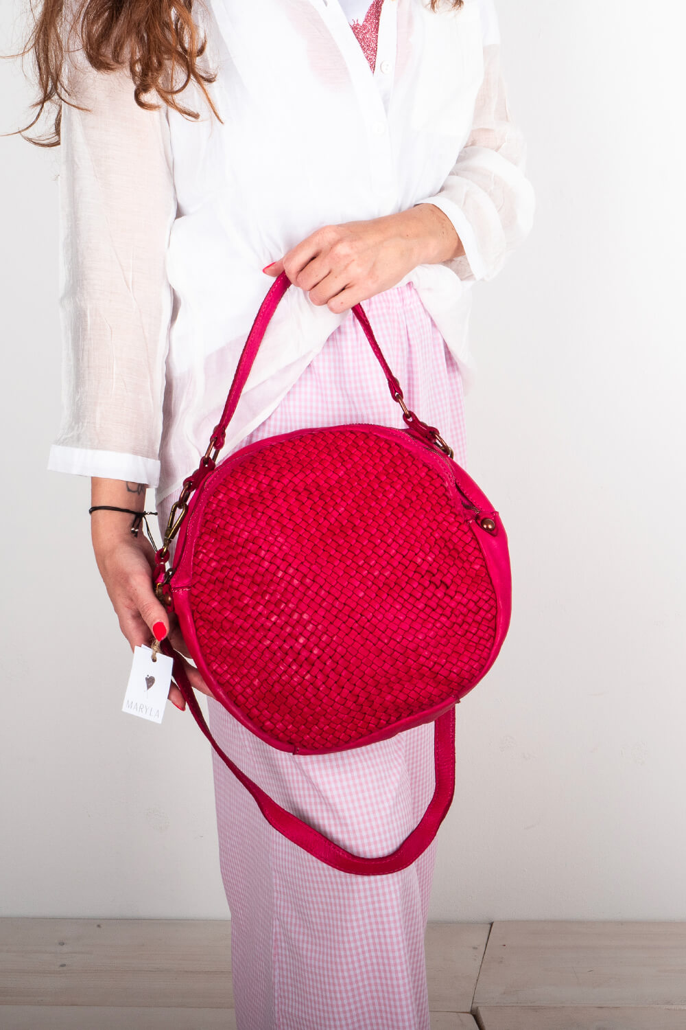 Borsa fucsia pelle intrecciata donna